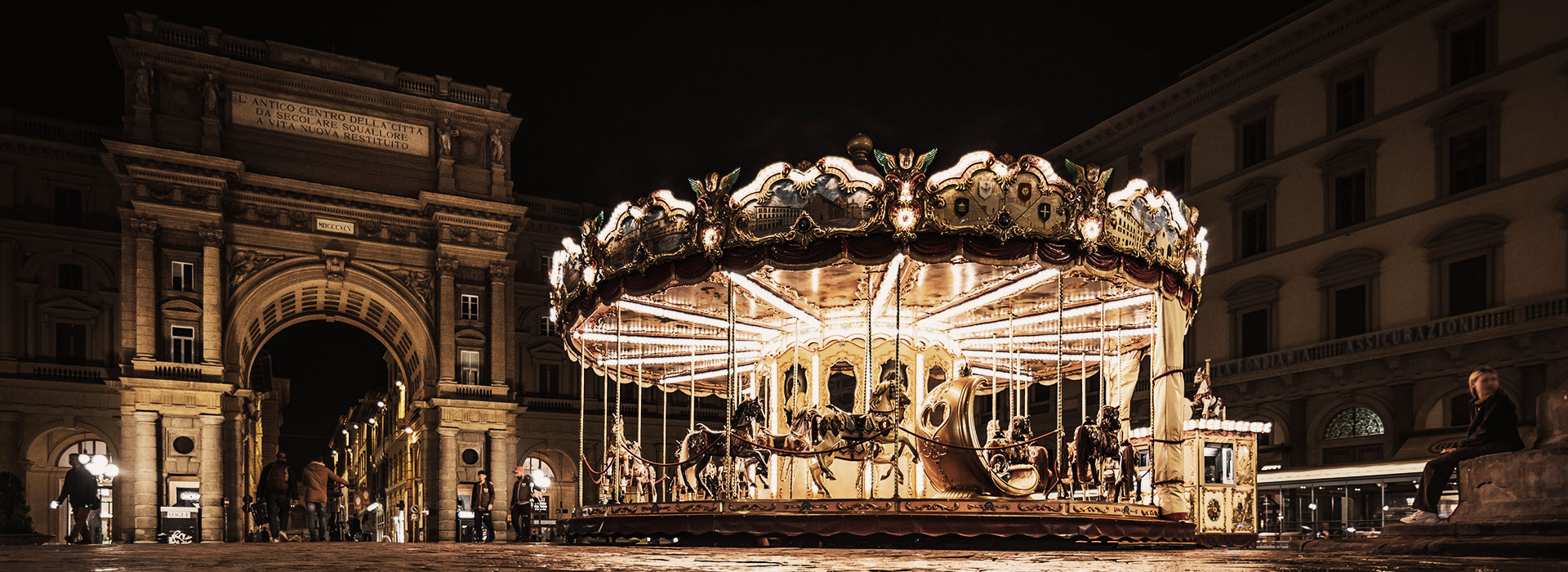 Carousel at night in city